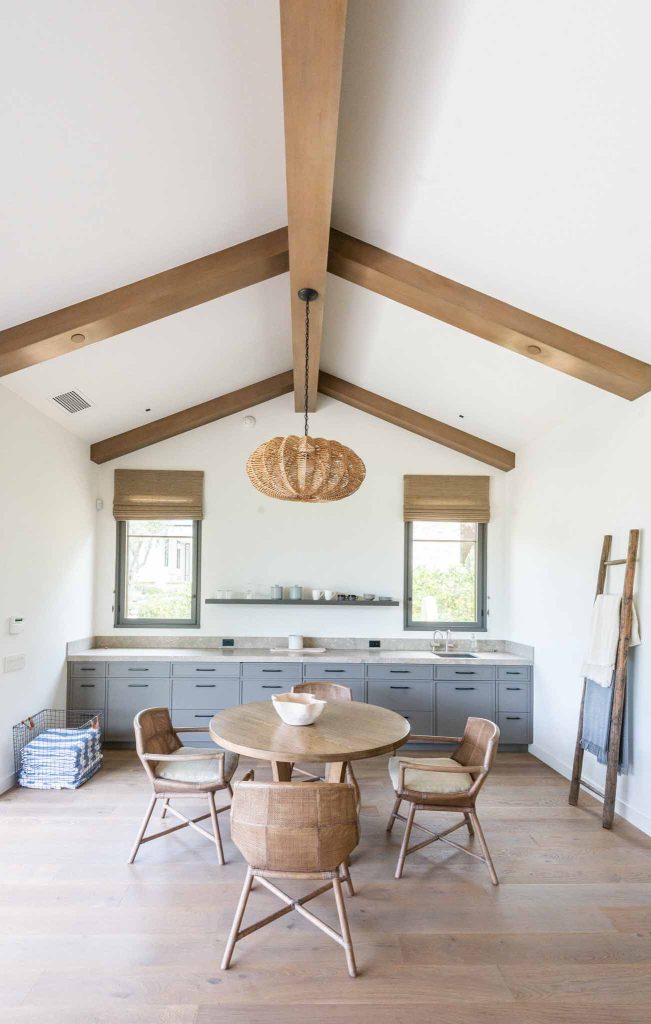 Inspiration for a modern backyard stone and rectangular pool house remodel in Santa Barbara