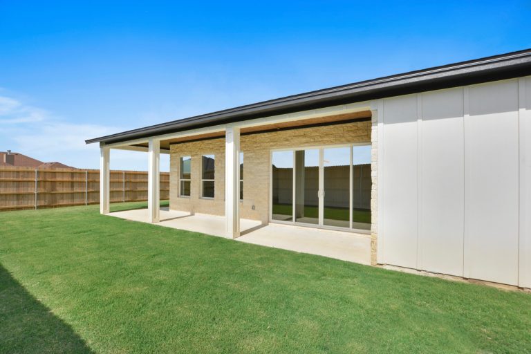 Inspiration for a modern concrete porch remodel in Austin by Aernandez Homes | Outdoor Photos | Porch | Landscaping | Landscape Design | Outdoor Living Space | Porch Design Ideas | Outdoor Living Space Ideas | Backyard Design