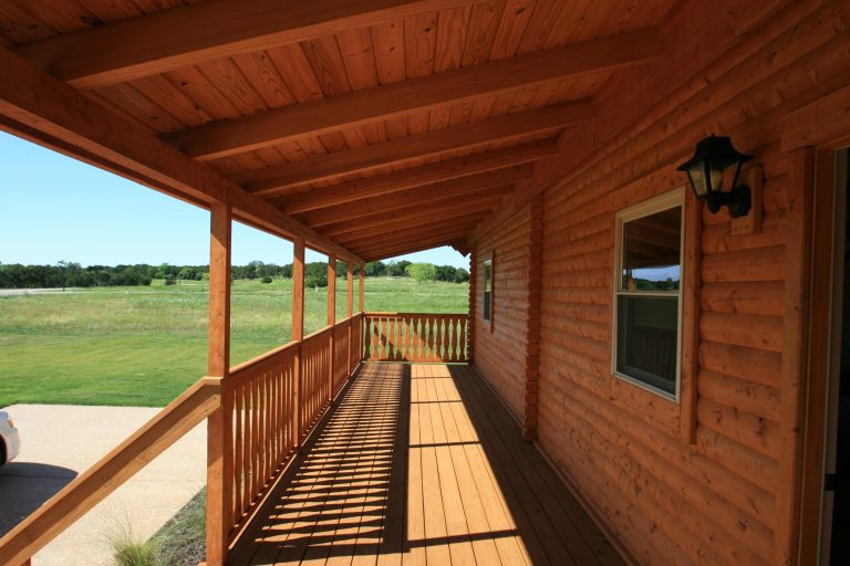 Inspiration for a rustic front porch remodel in Philadelphia with decking and a roof extension by Conestoga Log Cabins | Outdoor Photos | Porch | Landscaping | Landscape Design | Outdoor Living Space | Porch Design Ideas | Outdoor Living Space Ideas | Backyard Design