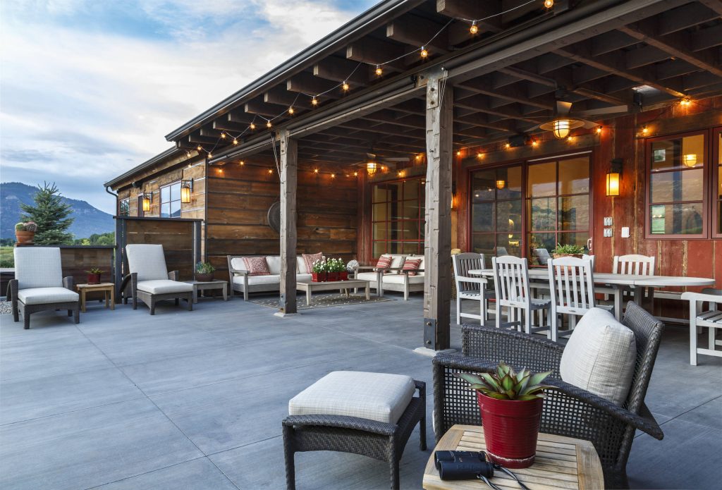 Inspiration for a rustic porch container garden remodel in Los Angeles with a roof extension by | Outdoor Photos | Porch | Landscaping | Landscape Design | Outdoor Living Space | Porch Design Ideas | Outdoor Living Space Ideas | Backyard Design