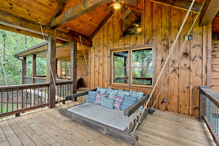 Inspiration for a rustic porch remodel in Atlanta with a roof extension by Sisson Dupont & Carder | Outdoor Photos | Porch | Landscaping | Landscape Design | Outdoor Living Space | Porch Design Ideas | Outdoor Living Space Ideas | Backyard Design