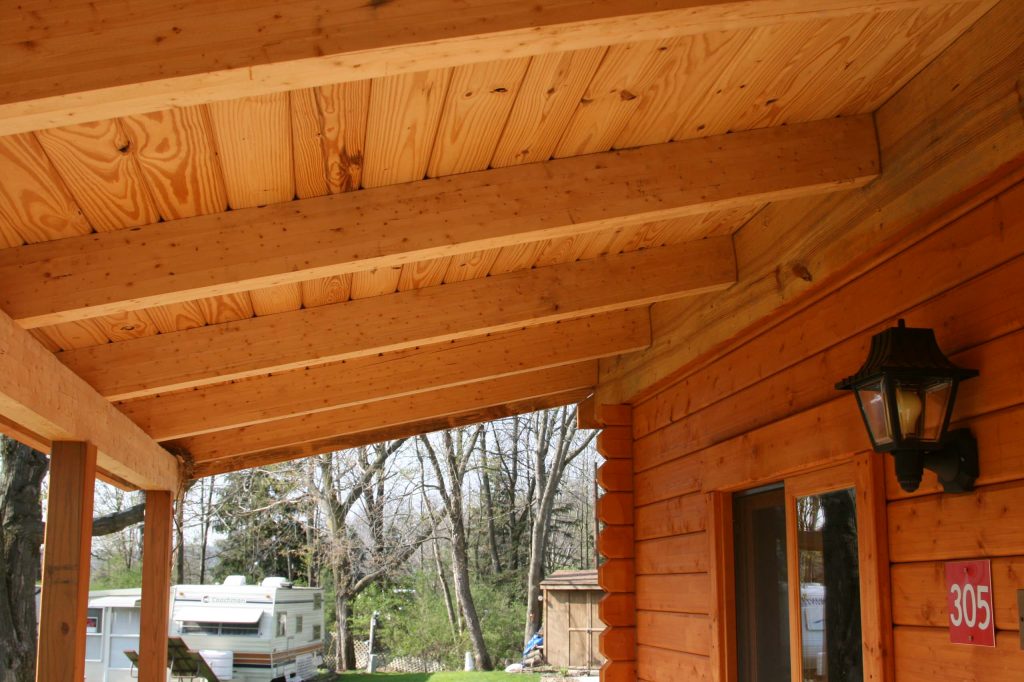 Inspiration for a rustic porch remodel in Philadelphia by Conestoga Log Cabins | Outdoor Photos | Porch | Landscaping | Landscape Design | Outdoor Living Space | Porch Design Ideas | Outdoor Living Space Ideas | Backyard Design