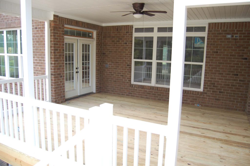 Inspiration for a screened-in back porch remodel in Other with a roof extension by ARENA Builders | Outdoor Photos | Porch | Landscaping | Landscape Design | Outdoor Living Space | Porch Design Ideas | Outdoor Living Space Ideas | Backyard Design