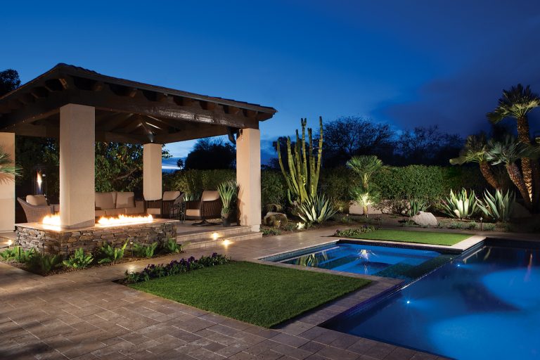 Inspiration for a small southwestern backyard stone and rectangular pool remodel in Phoenix