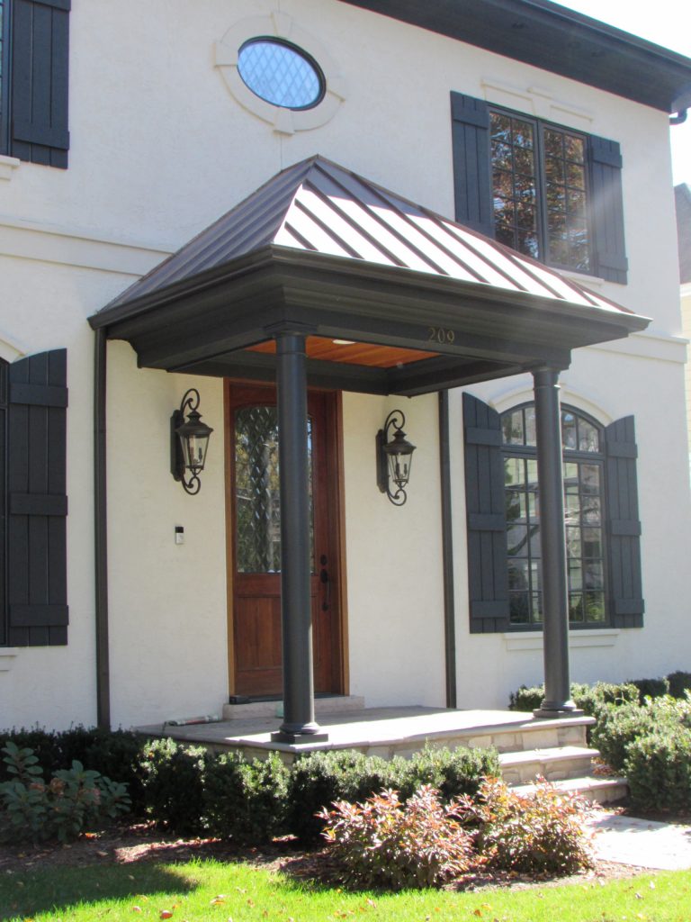 Inspiration for a small timeless concrete paver front porch remodel in Chicago with a roof extension by Bryan Assoc. Inc. Architects | Outdoor Photos | Porch | Landscaping | Landscape Design | Outdoor Living Space | Porch Design Ideas | Outdoor Living Space Ideas | Backyard Design