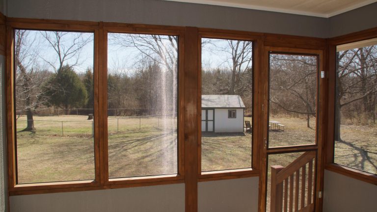 Inspiration for a small timeless screened-in back porch remodel in Other with decking and a roof extension by Winston Brown Remodeling | Outdoor Photos | Porch | Landscaping | Landscape Design | Outdoor Living Space | Porch Design Ideas | Outdoor Living Space Ideas | Backyard Design