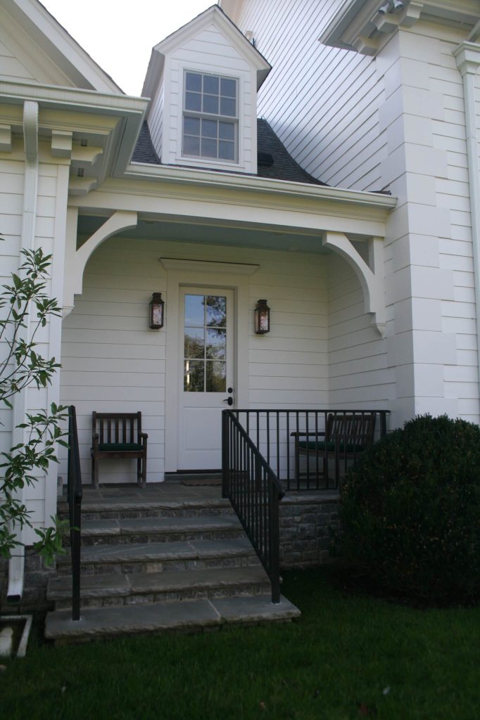Inspiration for a small timeless stone back porch remodel in Nashville with a roof extension by Farris Concepts in Architecture | Outdoor Photos | Porch | Landscaping | Landscape Design | Outdoor Living Space | Porch Design Ideas | Outdoor Living Space Ideas | Backyard Design