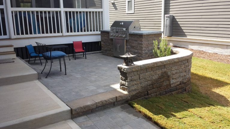 Inspiration for a small transitional front yard concrete paver patio kitchen remodel in Raleigh with no cover