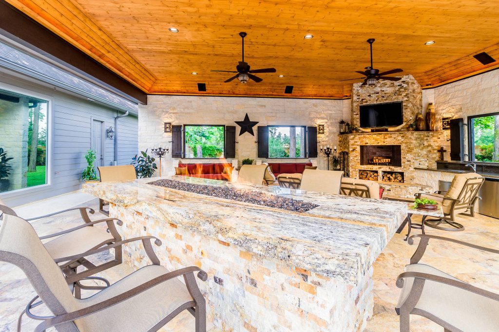 Inspiration for a timeless backyard patio kitchen remodel in Houston with a gazebo