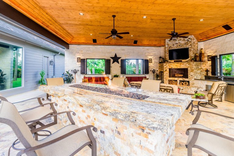 Inspiration for a timeless backyard patio kitchen remodel in Houston with a gazebo