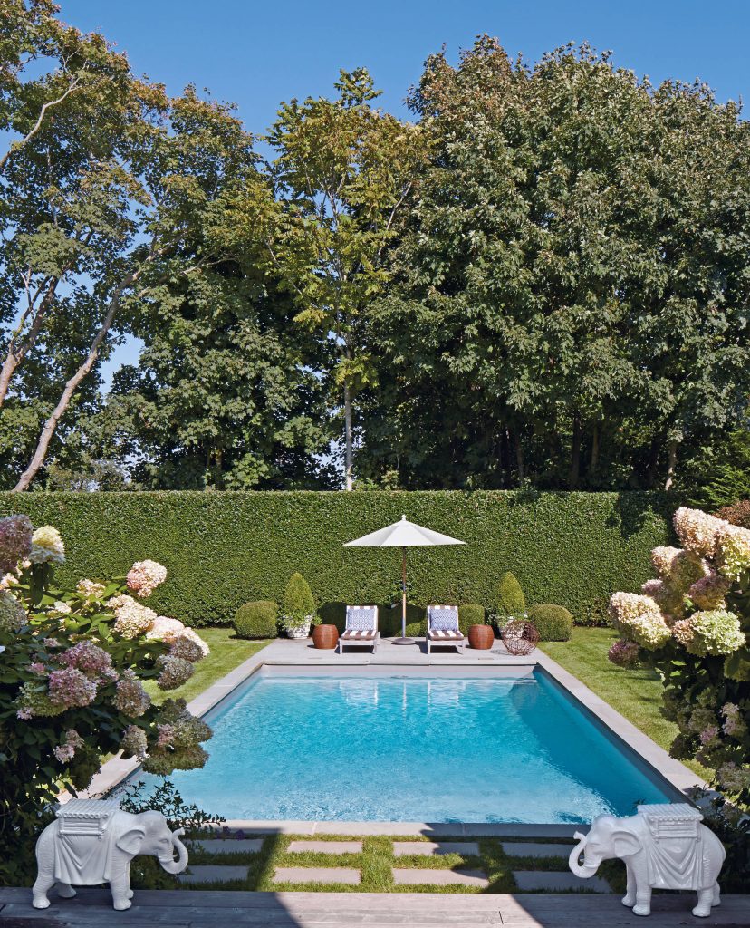 Inspiration for a timeless backyard pool remodel in New York