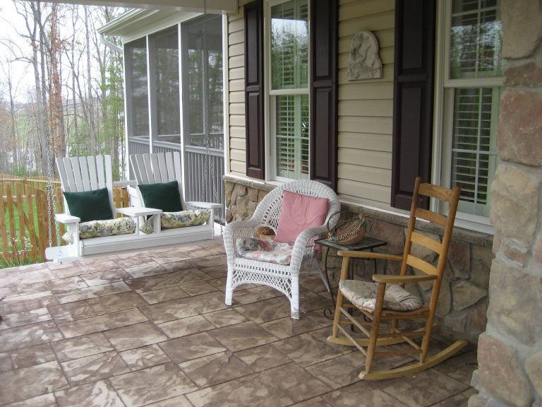 Inspiration for a timeless front porch remodel in DC Metro with a roof extension by Graystone Homes, Inc. | Outdoor Photos | Porch | Landscaping | Landscape Design | Outdoor Living Space | Porch Design Ideas | Outdoor Living Space Ideas | Backyard Design