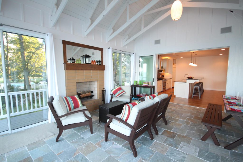 Inspiration for a timeless porch remodel in Grand Rapids with a fire pit by Cottage Home, Inc. | Outdoor Photos | Porch | Landscaping | Landscape Design | Outdoor Living Space | Porch Design Ideas | Outdoor Living Space Ideas | Backyard Design