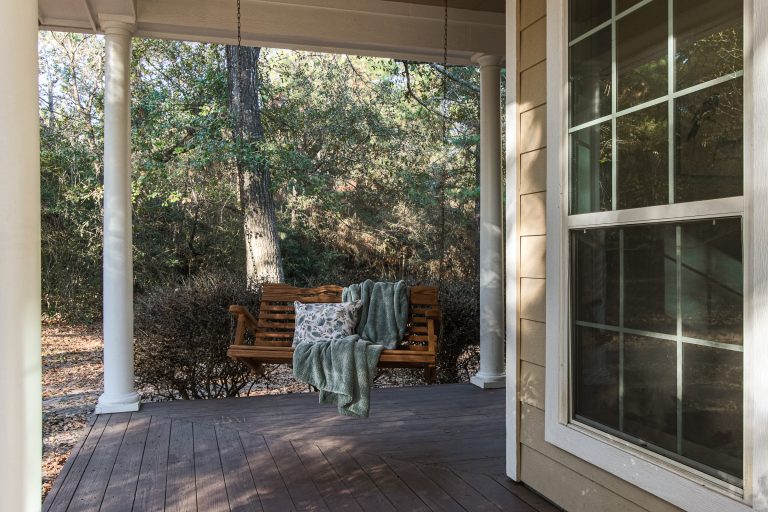Inspiration for a timeless porch remodel in Houston by COVENTRY HOMES - Built Around You | Outdoor Photos | Porch | Landscaping | Landscape Design | Outdoor Living Space | Porch Design Ideas | Outdoor Living Space Ideas | Backyard Design