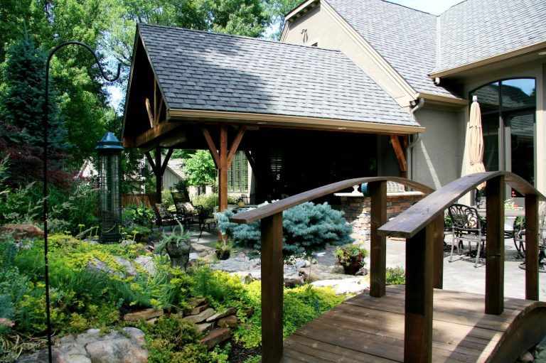 Inspiration for a timeless porch remodel in Kansas City by Deckscapes / DS Construction, Inc. | Outdoor Photos | Porch | Landscaping | Landscape Design | Outdoor Living Space | Porch Design Ideas | Outdoor Living Space Ideas | Backyard Design