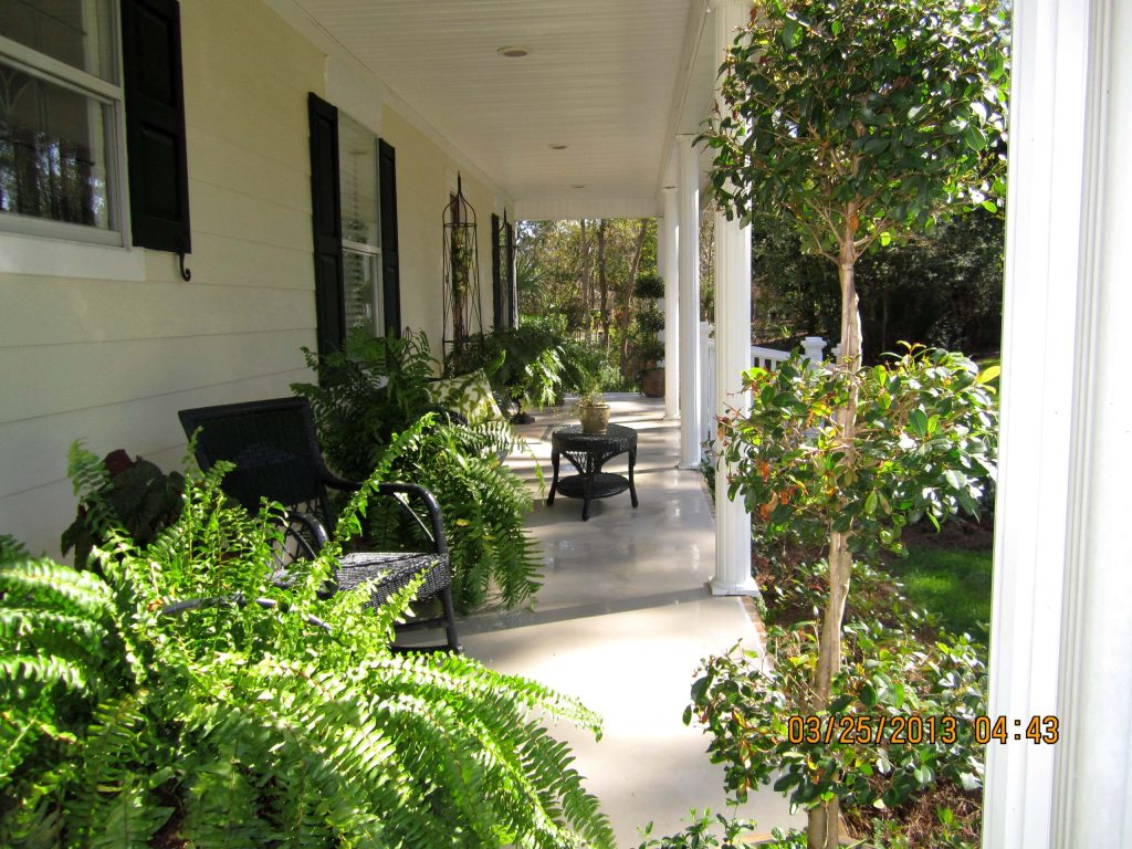 Inspiration for a timeless porch remodel in Other by Norman's Overhead Doors & Gates, Inc. | Outdoor Photos | Porch | Landscaping | Landscape Design | Outdoor Living Space | Porch Design Ideas | Outdoor Living Space Ideas | Backyard Design