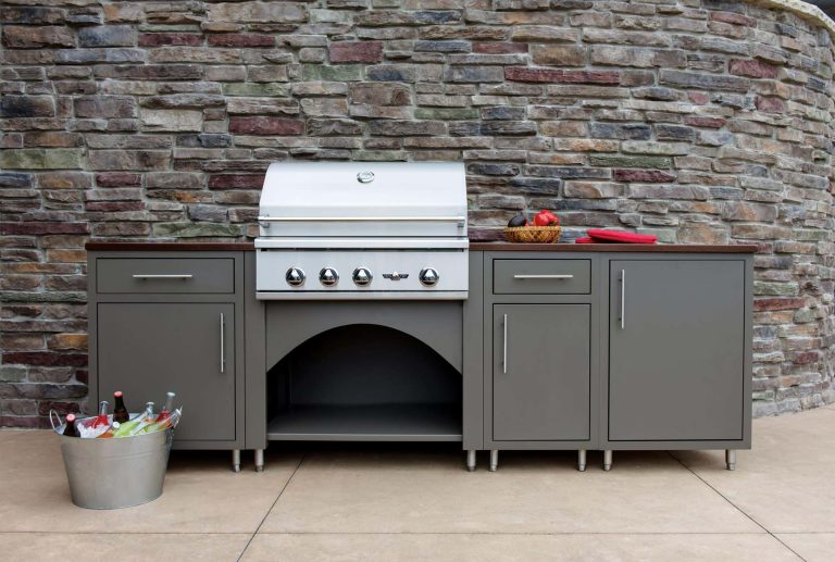 Inspiration for a timeless side yard stamped concrete patio kitchen remodel in Other with no cover