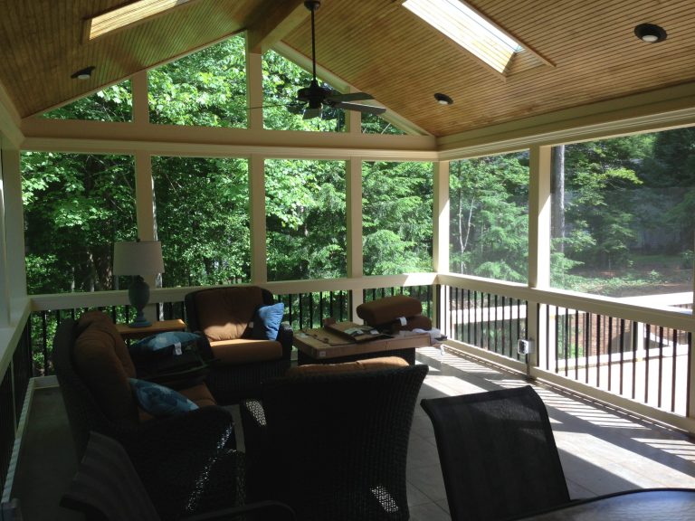 Inspiration for a timeless stamped concrete back porch remodel in Raleigh with a roof extension by InsideOut Construction, Inc. | Outdoor Photos | Porch | Landscaping | Landscape Design | Outdoor Living Space | Porch Design Ideas | Outdoor Living Space Ideas | Backyard Design