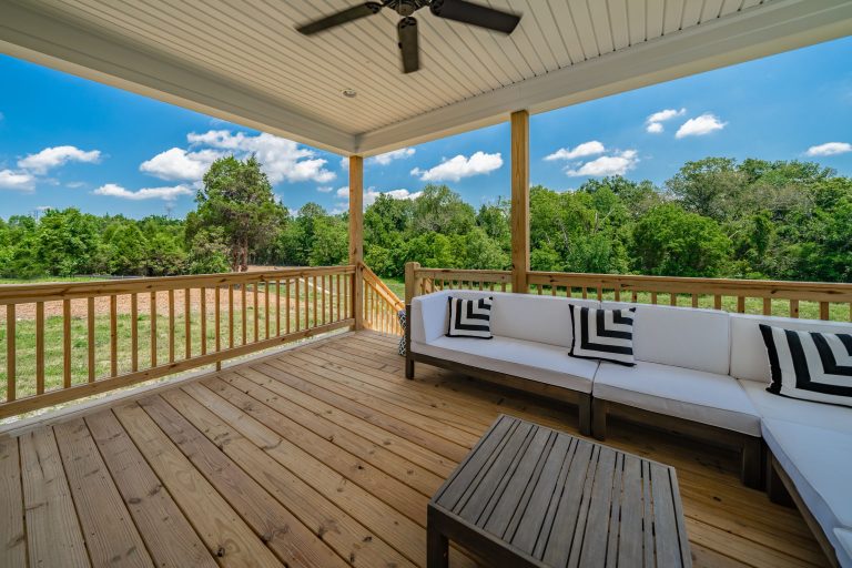 Inspiration for a transitional back porch remodel in Huntington with decking and a roof extension by Bentley Construction LLC | Outdoor Photos | Porch | Landscaping | Landscape Design | Outdoor Living Space | Porch Design Ideas | Outdoor Living Space Ideas | Backyard Design