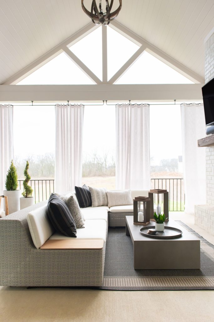 Inspiration for a transitional metal railing porch remodel in Nashville with a roof extension by ONYX & ALABASTER | Outdoor Photos | Porch | Landscaping | Landscape Design | Outdoor Living Space | Porch Design Ideas | Outdoor Living Space Ideas | Backyard Design