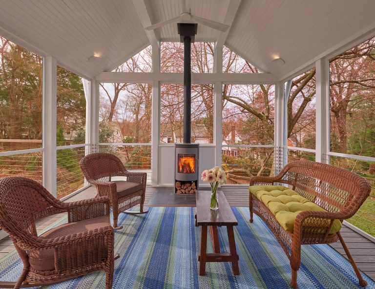 Inspiration for a transitional porch remodel in DC Metro with a fireplace and a roof extension by Balodemas Architects | Outdoor Photos | Porch | Landscaping | Landscape Design | Outdoor Living Space | Porch Design Ideas | Outdoor Living Space Ideas | Backyard Design