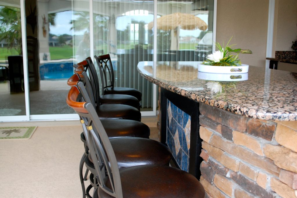 Inspiration for a transitional porch remodel in Orlando by Gingerich Design Center | Outdoor Photos | Porch | Landscaping | Landscape Design | Outdoor Living Space | Porch Design Ideas | Outdoor Living Space Ideas | Backyard Design