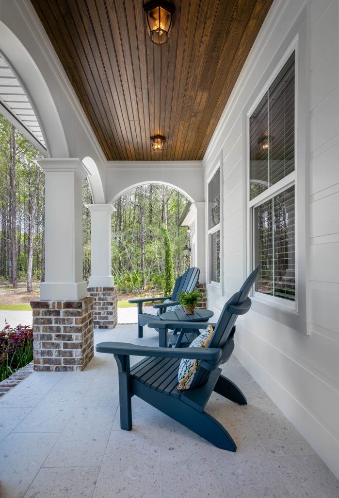 Inspiration for a transitional porch remodel in Other with a roof extension by Randy Wise Homes Inc | Outdoor Photos | Porch | Landscaping | Landscape Design | Outdoor Living Space | Porch Design Ideas | Outdoor Living Space Ideas | Backyard Design