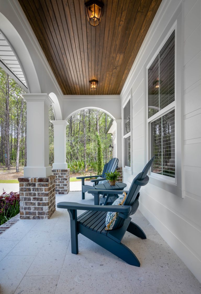 Inspiration for a transitional porch remodel in Other with a roof extension by Randy Wise Homes Inc | Outdoor Photos | Porch | Landscaping | Landscape Design | Outdoor Living Space | Porch Design Ideas | Outdoor Living Space Ideas | Backyard Design