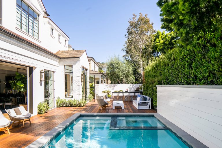 Inspiration for a transitional rectangular pool remodel in Los Angeles with decking