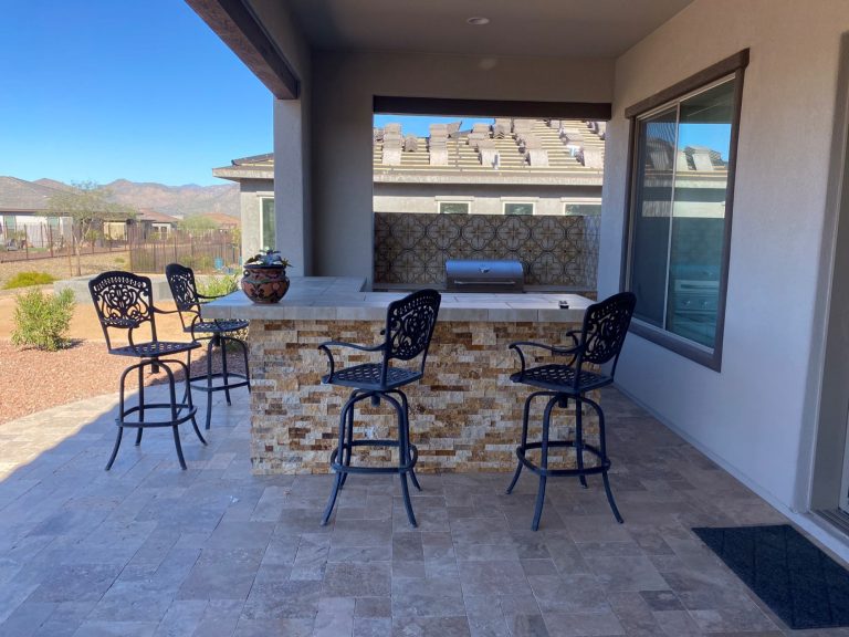 Inspiration for a transitional stone patio kitchen remodel in Phoenix