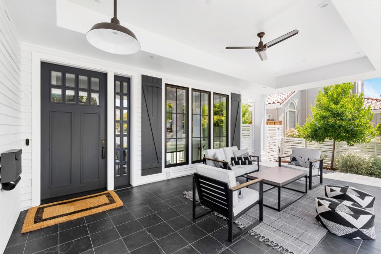 Inspiration for a transitional tile front porch remodel in San Francisco with a roof extension by Greenberg Design Gallery | Outdoor Photos | Porch | Landscaping | Landscape Design | Outdoor Living Space | Porch Design Ideas | Outdoor Living Space Ideas | Backyard Design