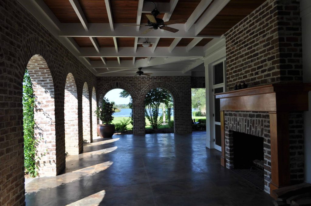 Inspiration for a tropical porch remodel in Atlanta by Frederick + Frederick Architects | Outdoor Photos | Porch | Landscaping | Landscape Design | Outdoor Living Space | Porch Design Ideas | Outdoor Living Space Ideas | Backyard Design