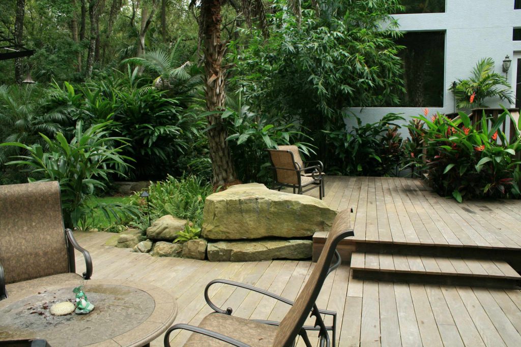 Inspiration for a tropical porch remodel in Tampa by Conner Landscape Architects | Outdoor Photos | Porch | Landscaping | Landscape Design | Outdoor Living Space | Porch Design Ideas | Outdoor Living Space Ideas | Backyard Design