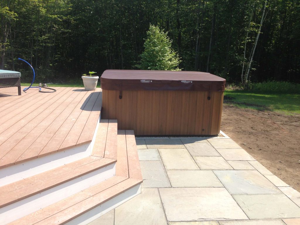 Integration of deck, patio and hot tub.