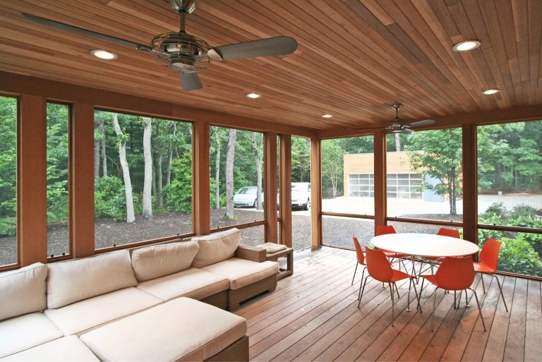 Ipe decking and a cedar ceiling in the large screened porch.