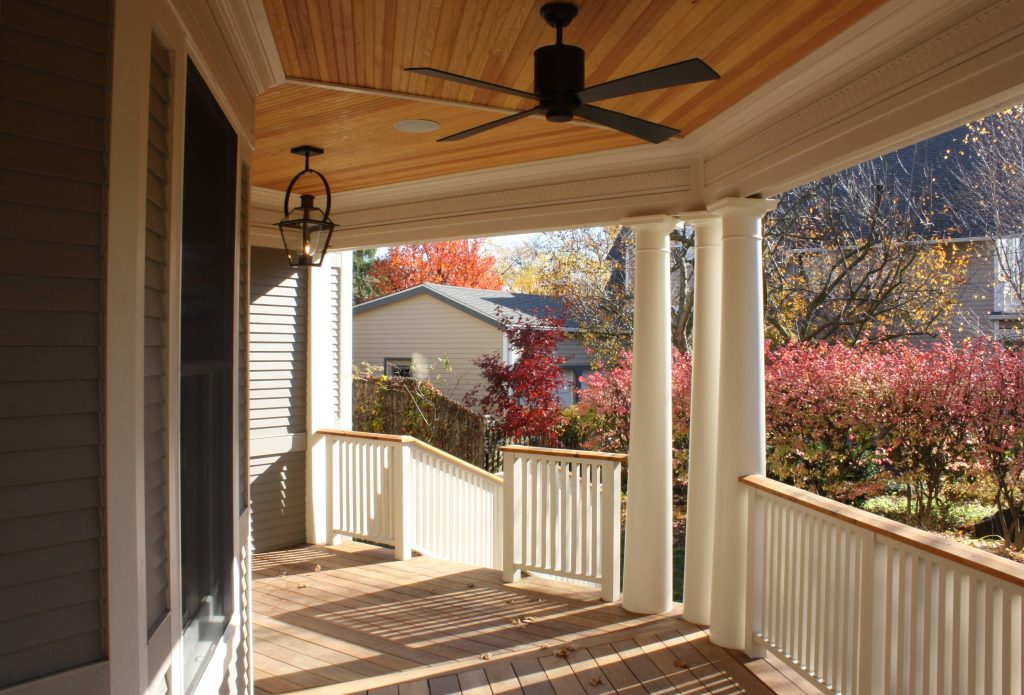 Ipe hardwood decking, cast plaster panels, New Orleans Bevolo light fixtures
