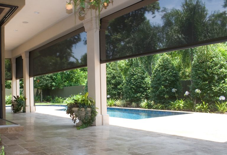 Island style screened-in back porch photo in Other with a roof extension by PHANTOM RETRACTABLE SCREENS | Outdoor Photos | Porch | Landscaping | Landscape Design | Outdoor Living Space | Porch Design Ideas | Outdoor Living Space Ideas | Backyard Design