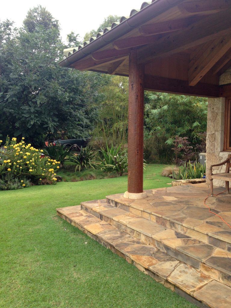 Island style stone porch photo in Hawaii by Kurt Magness Architect Maui | Outdoor Photos | Porch | Landscaping | Landscape Design | Outdoor Living Space | Porch Design Ideas | Outdoor Living Space Ideas | Backyard Design