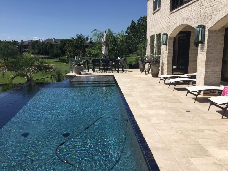 Ivory pool coping and versailles pattern pavers