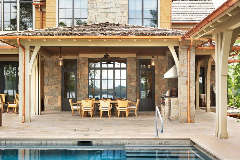 Lake Front Country Estate Outdoor Dining, designed by Tom Markalunas, built by Resort Custom Homes. Photography by Rachael Boling