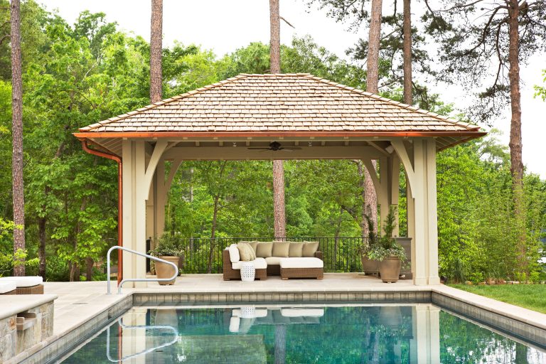 Lake Front Country Estate Pool Pavilion, designed by Tom Markalunas, built by Resort Custom Homes and Signature Pools. Photography by Rachael Boling