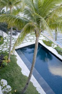 Landscape Architecture & Photography by Raymond Jungles Inc. Project utilized Florida Keystone flagging provided by Larry's Cap Rock & Stone Inc.