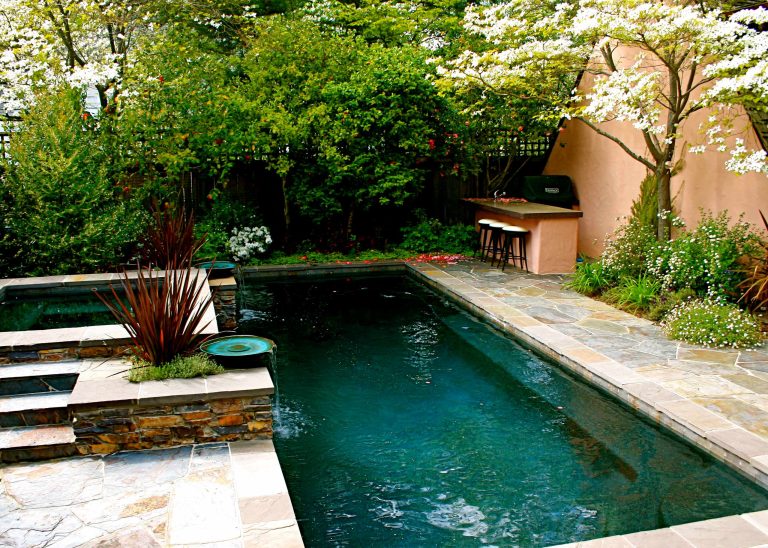 Lap pool, spa, water feature and outdoor kitchen all tucked in to a small space!