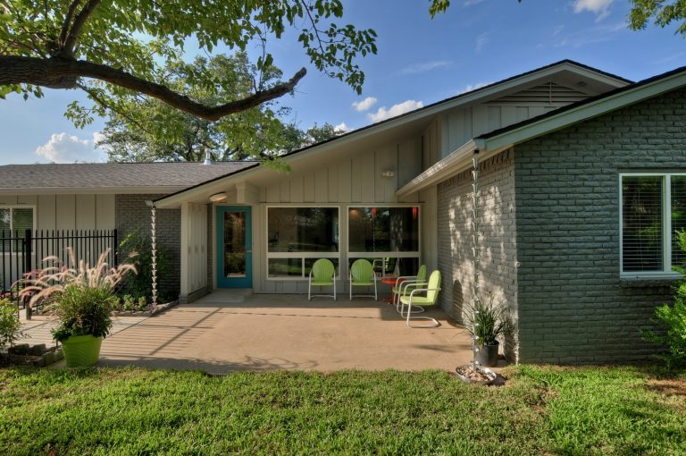 Large 1960s concrete back porch photo in Dallas with a roof extension by PBH Design | Outdoor Photos | Porch | Landscaping | Landscape Design | Outdoor Living Space | Porch Design Ideas | Outdoor Living Space Ideas | Backyard Design