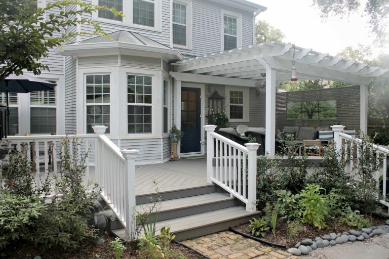 Large arts and crafts back porch photo in New Orleans with decking and a pergola by Jackson Construction, Inc. | Outdoor Photos | Porch | Landscaping | Landscape Design | Outdoor Living Space | Porch Design Ideas | Outdoor Living Space Ideas | Backyard Design