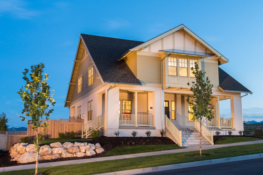 Large arts and crafts front porch idea in Salt Lake City with a roof extension by Destination Homes | Outdoor Photos | Porch | Landscaping | Landscape Design | Outdoor Living Space | Porch Design Ideas | Outdoor Living Space Ideas | Backyard Design