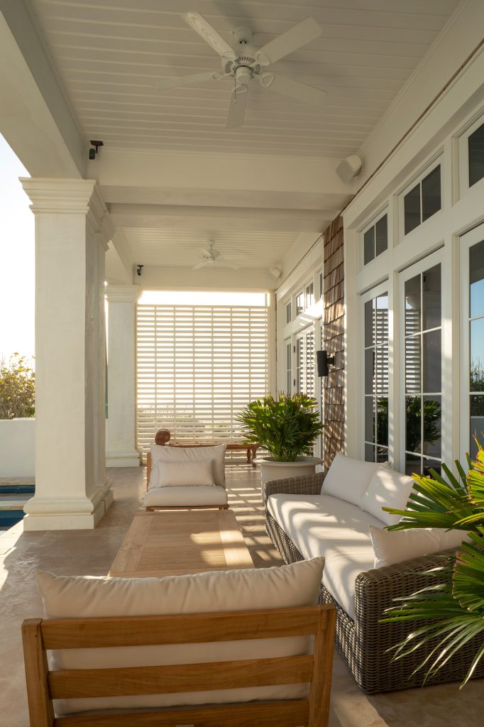 Large beach style concrete paver porch idea in Other with a roof extension by Geoff Chick & Associates | Outdoor Photos | Porch | Landscaping | Landscape Design | Outdoor Living Space | Porch Design Ideas | Outdoor Living Space Ideas | Backyard Design