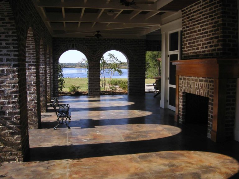 Large classic concrete porch idea in Atlanta with a fire pit by Frederick + Frederick Architects | Outdoor Photos | Porch | Landscaping | Landscape Design | Outdoor Living Space | Porch Design Ideas | Outdoor Living Space Ideas | Backyard Design