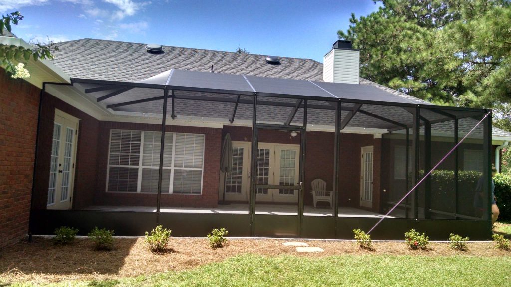 Large classic concrete screened-in back porch idea in Miami with a roof extension by Island Enclosures & Improvements LLC | Outdoor Photos | Porch | Landscaping | Landscape Design | Outdoor Living Space | Porch Design Ideas | Outdoor Living Space Ideas | Backyard Design