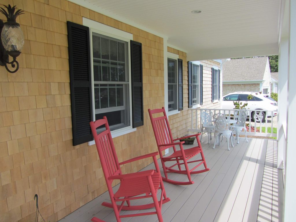 Large classic front porch idea in Boston with decking and a roof extension by Harry Ellis Builder, LLC. | Outdoor Photos | Porch | Landscaping | Landscape Design | Outdoor Living Space | Porch Design Ideas | Outdoor Living Space Ideas | Backyard Design